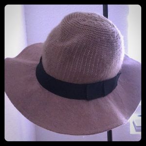Brown floppy summer hat with black trim